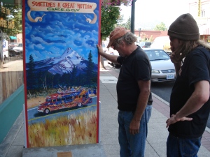 Randy checks out a painting of the Further Bus in Central Point, OR